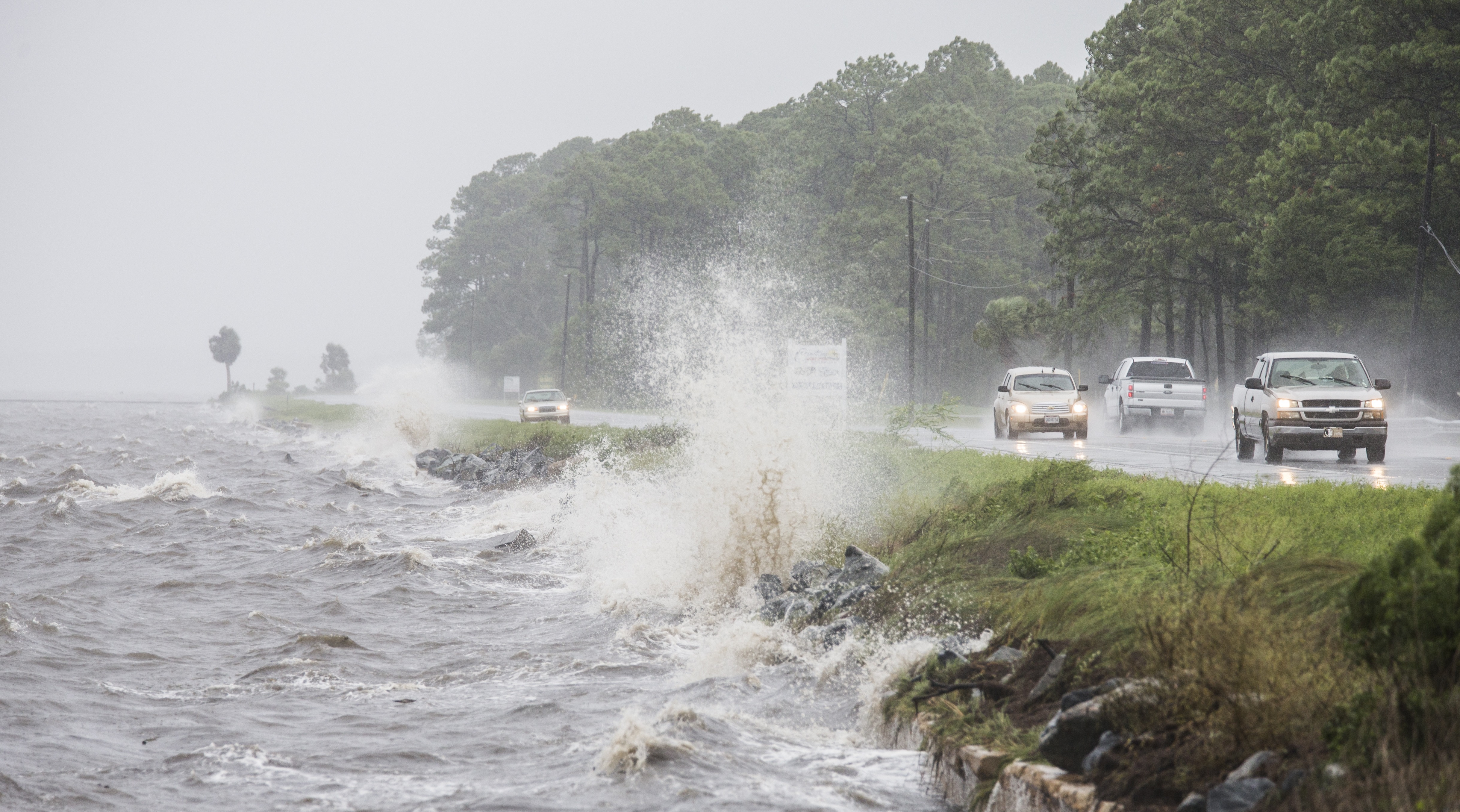 EASTPOINT, FL - SEPTEMBER 01: Traffic drives along US 98 as Hurricane Hermine approaches on September 1, 2016 in Eastpoint, Florida. Hurricane warnings have been issued for parts of Florida's Gulf Coast as Hermine is expected to make landfall as a Category 1 hurricane.