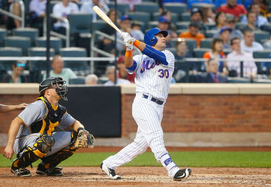 NEW YORK, NY - JUNE 16: Michael Conforto #30 of the New York Mets follows through on third inning home run against the Pittsburgh Pirates at Citi Field on June 16, 2016 in the Flushing neighborhood of the Queens borough of New York City. (Photo by Jim McIsaac/Getty Images)