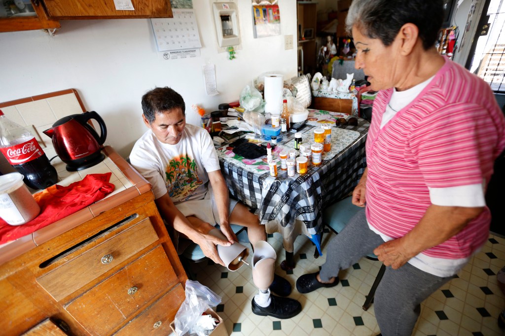 05/26/16/ LOS ANGELES/Luis Alfaro, amputee due to diabetes complications, with his wife Concepcion Alfaro speak to La Opinion from their Los Angeles home. (Photo Aurelia Ventura/ La Opinion)