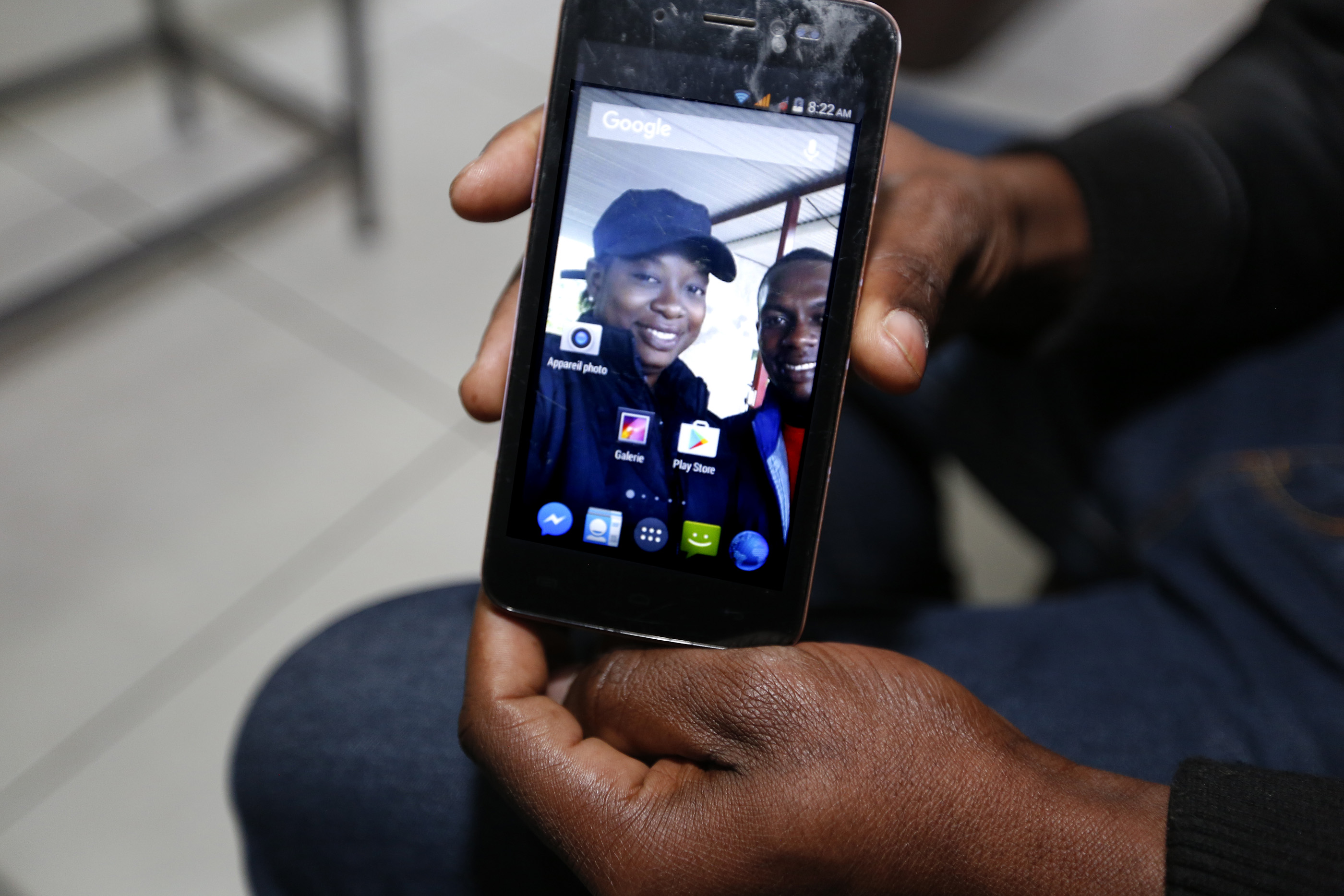 12/08/16/ TIJUANA/Haitian Lazarre John Arold shows a picture of his wife. Lazarre is among a handful of refugees who have decided to stay in Tijuana, Mexico. Haitian Lazarre John Arold receives help at the Salvation Army in Tijuana. An unprecedented arrival of Haitians and others seeking entry into the United States in recent weeks has sent Tijuanas migrant shelters scrambling to find beds, blankets, food and other necessities to serve this increase of people awaiting processing by U.S. authorities. (Photo Aurelia Ventura/ La Opinion)
